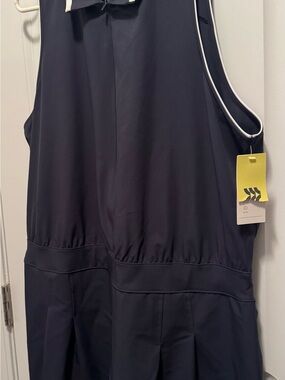 all in motion Black Sleeveless Romper with White Piping Trim